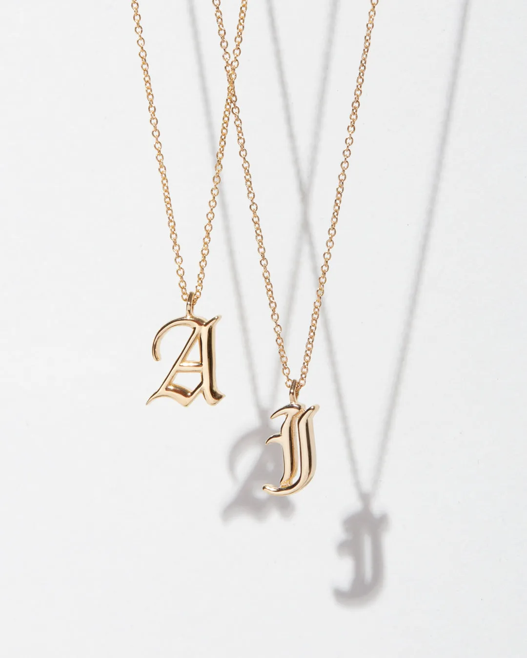 The Initial Charm Necklace [Old English]