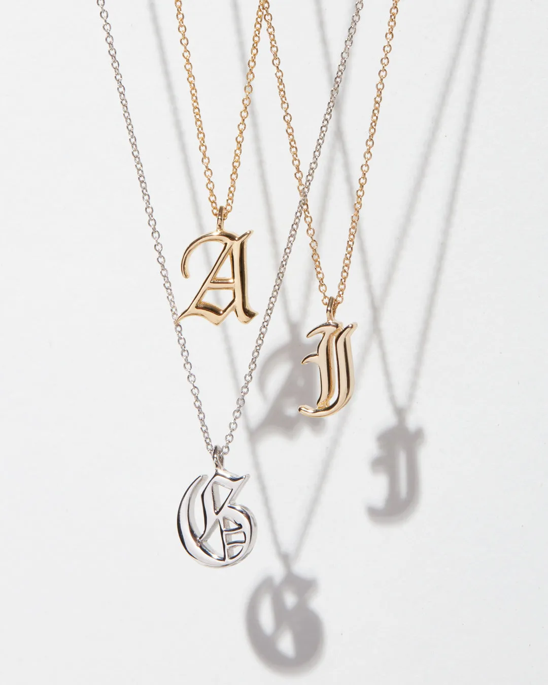 The Initial Charm Necklace [Old English]